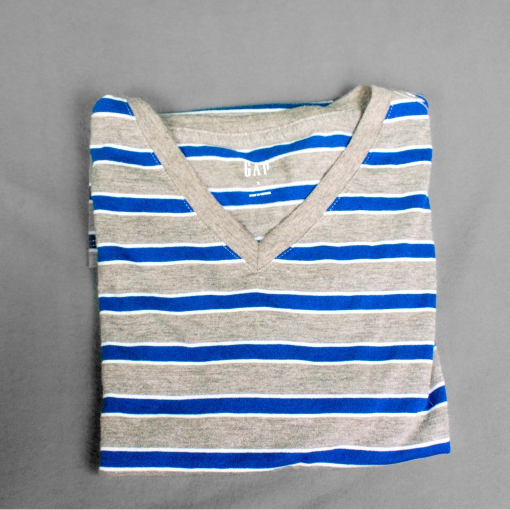 Small Grey Gap Tee. Comfortable fabric with blue and white stripes.
